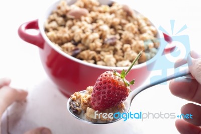 Eating Muesli And Fruit Stock Photo