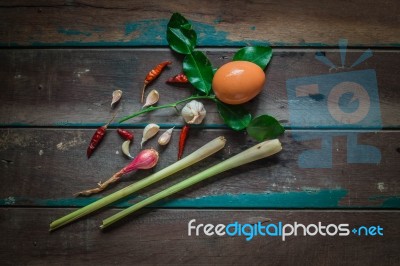 Egg And Spices On Wooden Stock Photo