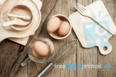 Egg, Chicken Egg In Wood Bowl, Top View Stock Photo