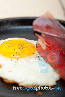 Egg Sunny Side Up With Italian Speck Ham Stock Photo