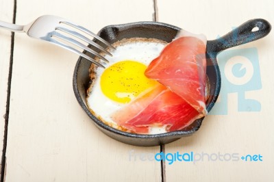 Egg Sunny Side Up With Italian Speck Ham Stock Photo