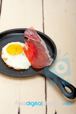 Egg Sunny Side Up With Italian Speck Ham Stock Photo