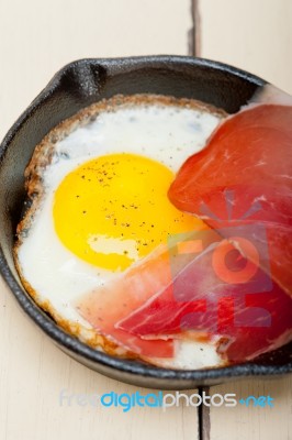 Egg Sunny Side Up With Italian Speck Ham Stock Photo