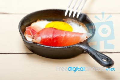 Egg Sunny Side Up With Italian Speck Ham Stock Photo