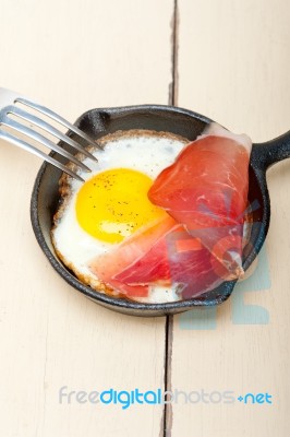 Egg Sunny Side Up With Italian Speck Ham Stock Photo