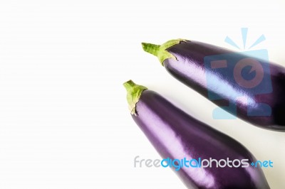 Eggplants On The White Background Stock Photo