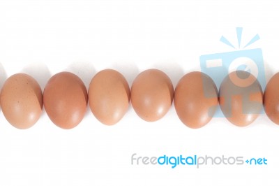 Eggs Aligned Horizontally Stock Photo