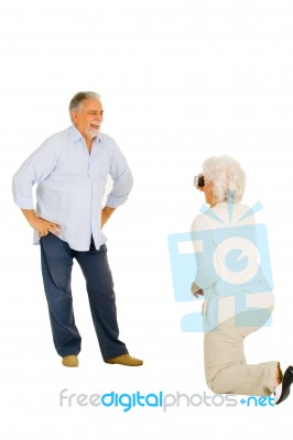 Elderly Couple Taking Photograph Stock Photo