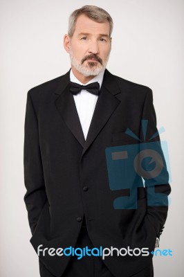 Elderly Man In Elegant Dark Formal Stock Photo