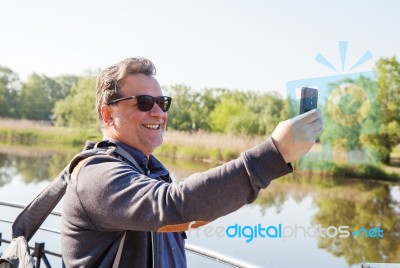 Elderly Man Makes Selfie Mobile Phone Stock Photo