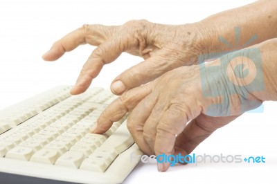 Elderly Woman Hands On Keyboard Stock Photo