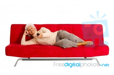 Elderly Woman TV Stock Photo