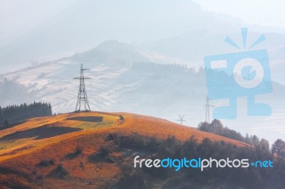 Electric Lines In Mountains Stock Photo