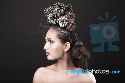 Elegant Girl In The New Year Wreath Of Pine Cones Stock Photo