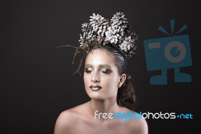 Elegant Girl In The New Year Wreath Of Pine Cones Stock Photo