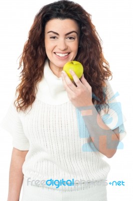 Elegant Woman Holding Fresh Green Apple Stock Photo