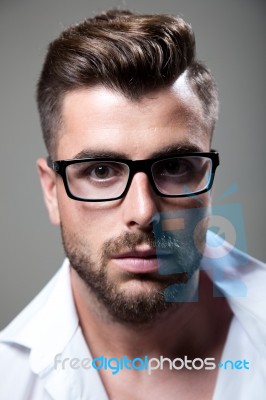 Elegant Young Handsome Man. Studio Fashion Portrait Stock Photo