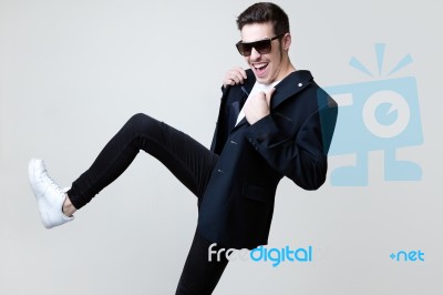 Elegant Young Handsome Man. Studio Fashion Portrait Stock Photo