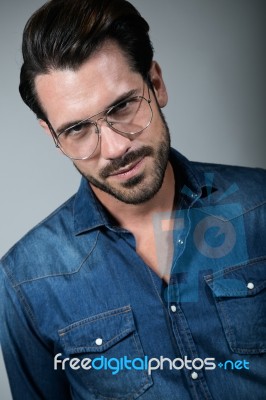 Elegant Young Handsome Man. Studio Fashion Portrait Stock Photo