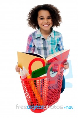 Elementary Age School Girl Reading A Book Stock Photo