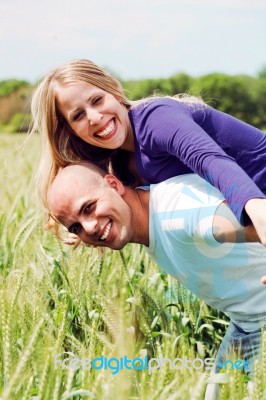 Embracing Lovely Lovers Having Fun Stock Photo