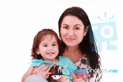 Embracing Mom And Daughter Stock Photo