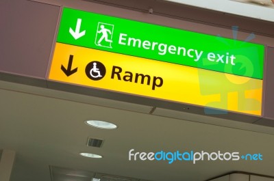 Emergency Exit And Ramp Access Sign Stock Photo