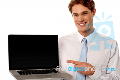 Employee Showcasing Brand New Laptop Stock Photo