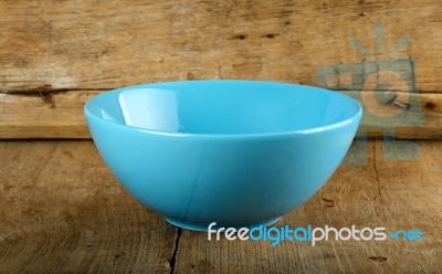 Empty Blue Bowl On The Wooden Background Stock Photo