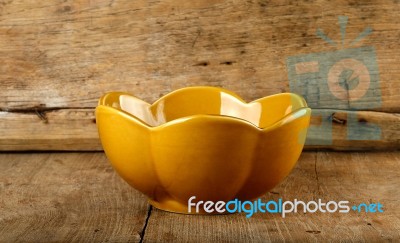 Empty Brown Bowl On The Wooden Background Stock Photo