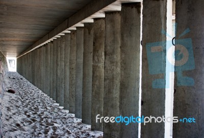 Empty Corridor Of Concrete Columns Stock Photo