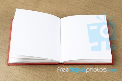 Empty Pages Of Opened Notebook On Wooden Table Stock Photo