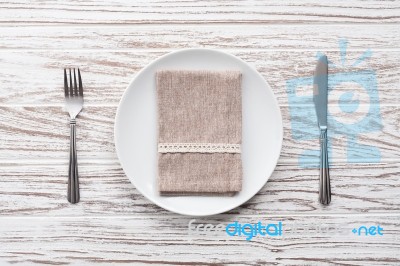 Empty Plate Napkin Fork Knife Silverware White Wooden Table Background Stock Photo