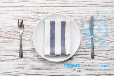 Empty Plate Napkin Fork Knife Silverware White Wooden Table Background Stock Photo