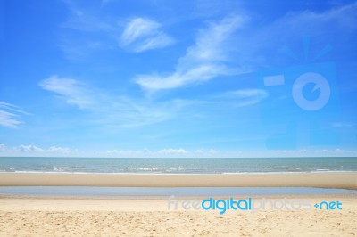 Empty Tropical Sea Beach With Some Cloud In Sunny Day Stock Photo