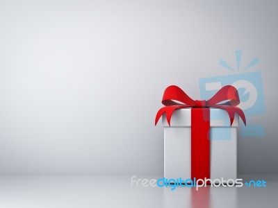 Empty White Wall With Gift Box Stock Image