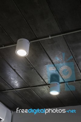 Energy Efficient Light Bulb On Ceiling Stock Photo