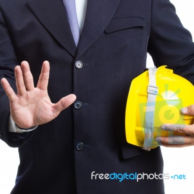 Engineer Holding Helmet On White Background Stock Photo