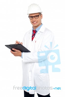 Engineer Preparing Report Looking At You Stock Photo