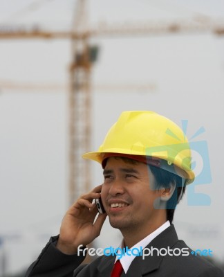 Engineer Talking Over Phone Stock Photo