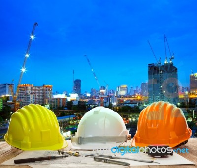 Engineer Working Table With Hard Hat Plan And Writing Tool Again… Stock Photo