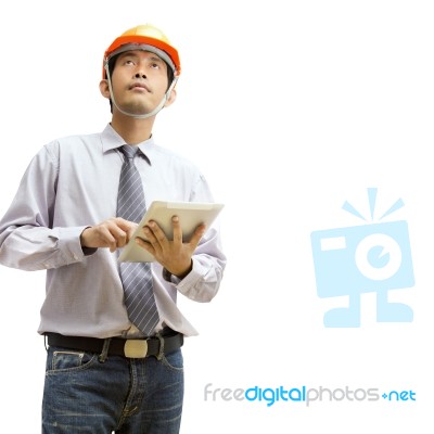 Engineers And Architects Using Digital Tablet Stock Photo