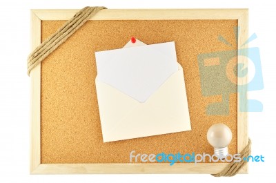 Envelope Pinned On Cork Notice Board Stock Photo