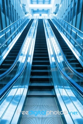 Escalator Going Up Stair Stock Photo