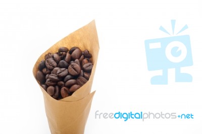 Espresso Coffee Beans On A Paper Cone Stock Photo