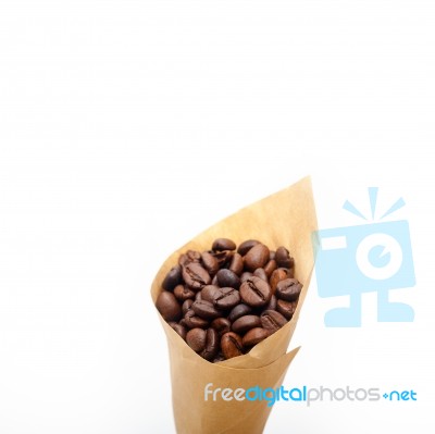 Espresso Coffee Beans On A Paper Cone Stock Photo