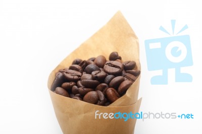 Espresso Coffee Beans On A Paper Cone Stock Photo