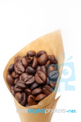 Espresso Coffee Beans On A Paper Cone Stock Photo