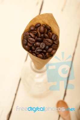 Espresso Coffee Beans On A Paper Cone Stock Photo