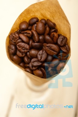 Espresso Coffee Beans On A Paper Cone Stock Photo